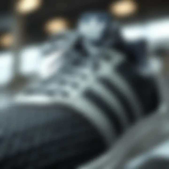 Intricate Design of Adidas Mesh Shoe Close-up of Adidas mesh shoe showcasing its intricate design elements and breathability