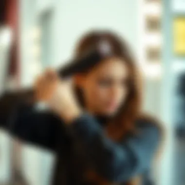 User demonstrating the technique of using a heated comb straightener