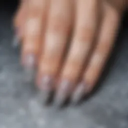 Elegant crystal acrylic nails with intricate designs