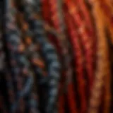 A close-up of vibrant kinky braiding hair in various styles and colors