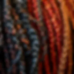 A close-up of vibrant kinky braiding hair in various styles and colors