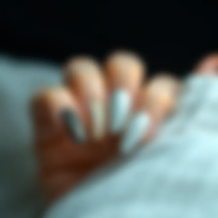 Creative nail art featuring intricate designs enhanced with shimmer powder