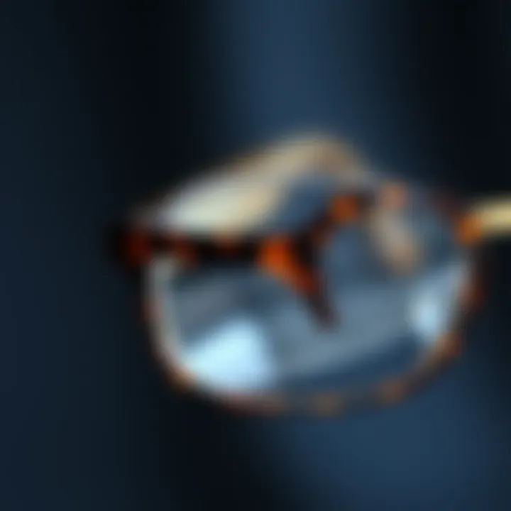 Close-up view of the intricate tortoiseshell pattern on the rim of clear glasses.