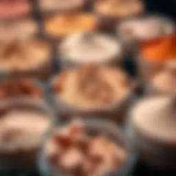 A vibrant display of various nude acrylic powder shades