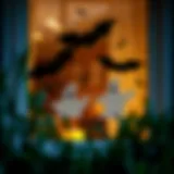Spooky Halloween window decals featuring ghosts and bats