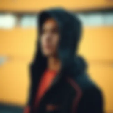 Close-up of functional features in a hooded athletic jacket