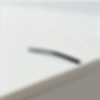 Sleek Minimal Hair Clip A close-up view of a sleek minimal hair clip placed on a smooth surface.