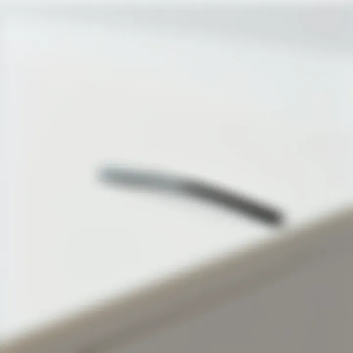 Sleek Minimal Hair Clip A close-up view of a sleek minimal hair clip placed on a smooth surface.