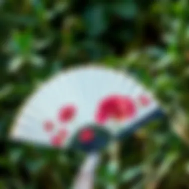 Sustainable Elegance in Nature Sustainable silk fan displayed in natural setting