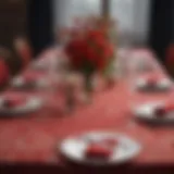 Elegant dining setup featuring a vibrant red patterned tablecloth