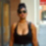 Chic Pairing: Elevating Plus Size Black Tanks Chic plus size black tank top stylishly paired with accessories