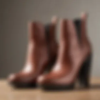 A variety of short chunky heel booties in different colors and materials.