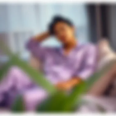 Stylish individual relaxing in light purple silk pajamas
