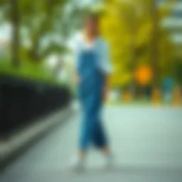 Elegant long denim overall dress styled for a casual outing