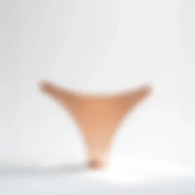 Elegant seamless invisible thong showcased on a minimalist background