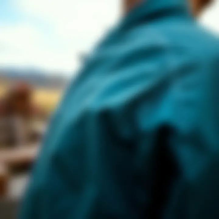 Lightweight Fabric and Intricate Stitching A close-up view of a thin windbreaker jacket showcasing its lightweight fabric and intricate stitching.