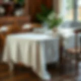 Elegant Cheesecloth Table Setting Elegant cheesecloth draped over a rustic wooden table