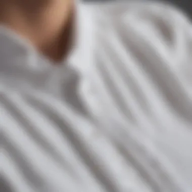 Close-up of luxurious fabric texture used in white statement blouses