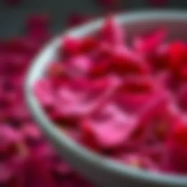 Close-up of vibrant dry rose petals in a bowl